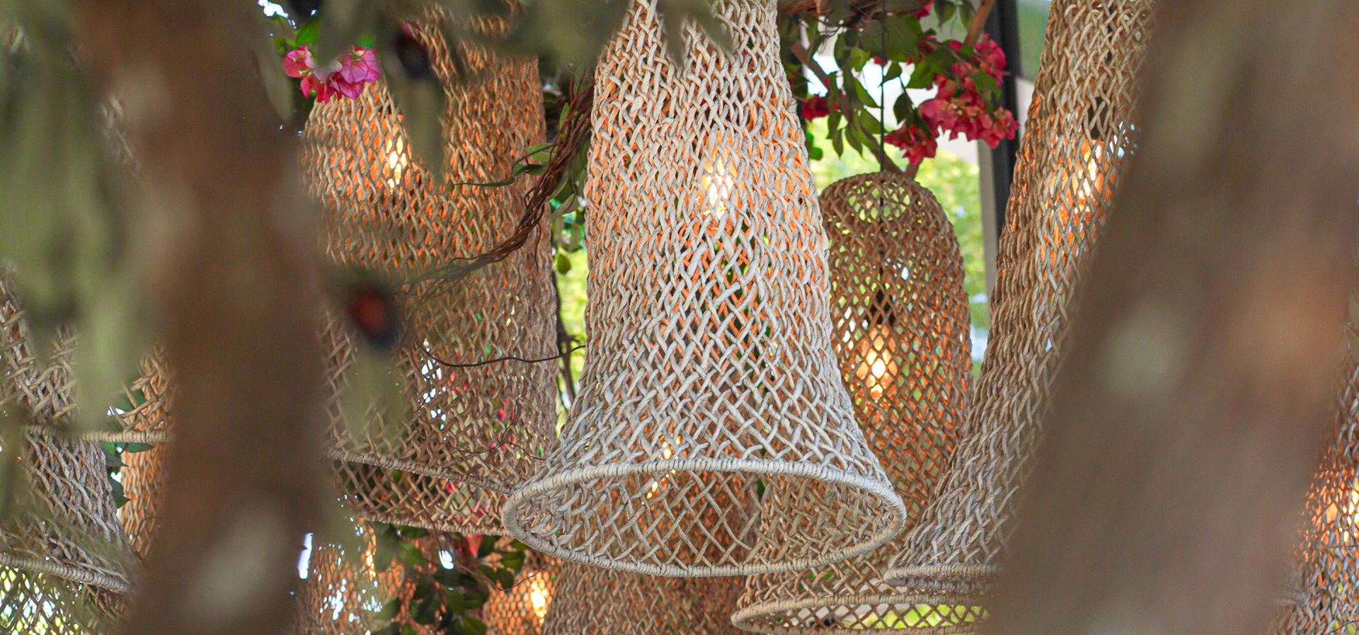 Decorative hanging wicker lanterns at Abbale restaurant creating a warm Mediterranean ambiance